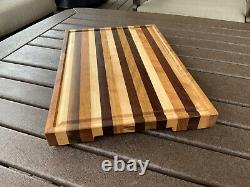 Curly Cherry, Maple, & Walnut edge grain cutting board with juice grooves