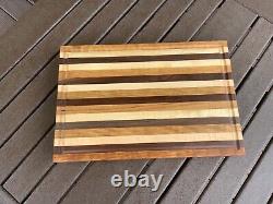 Curly Cherry, Maple, & Walnut edge grain cutting board with juice grooves