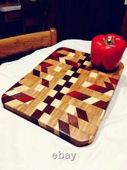 End grain wood cutting board made from Maple, Red Heart, Purple Heart and Walnut