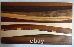 Hardwood cutting board. Handmade with several different woods. Christmas gift