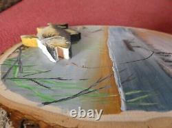 Découpe en bois de sandre peinte à la main sur du tilleul en bordure vivante par Phyllis.