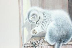 Une planche à découper peinte à la main avec un chat